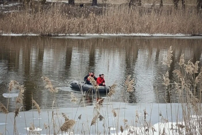 The body of a boy under the ice