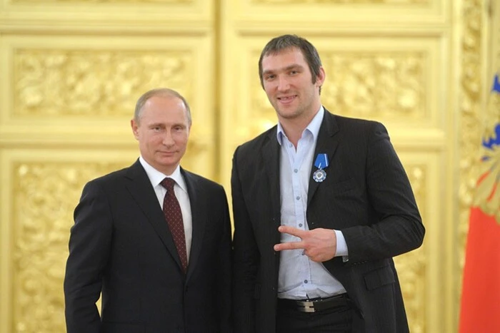 Portrait of Ovechkin with Putin in the background