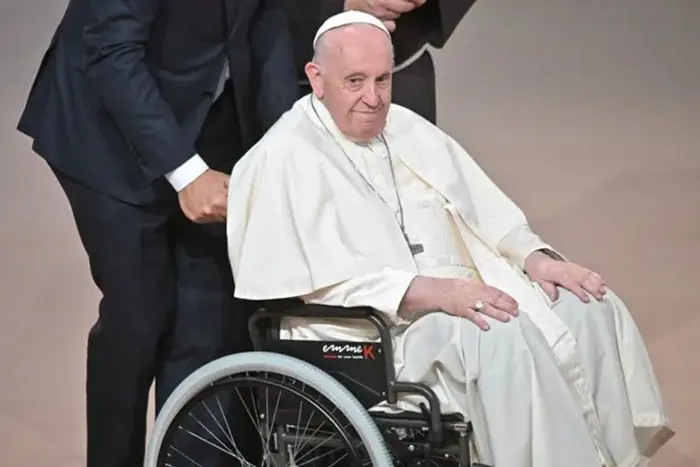 Pope Francis in a hospital bed