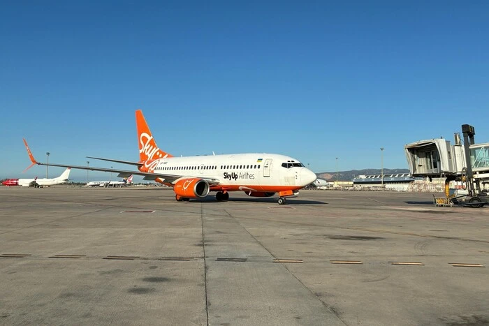 The company's plane flies over Barcelona