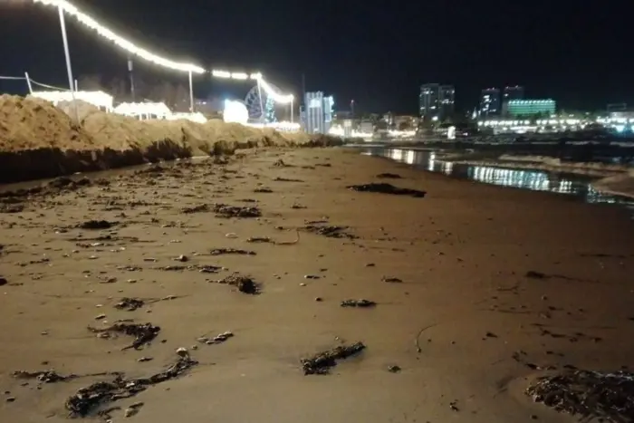 Fuel oil from sunken Russian tankers at Anapa beach