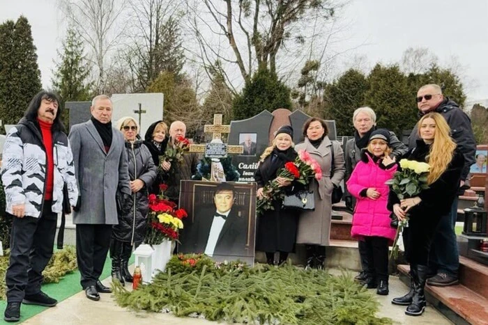 Family and friends at the grave of Vitaliy Bilonozhko