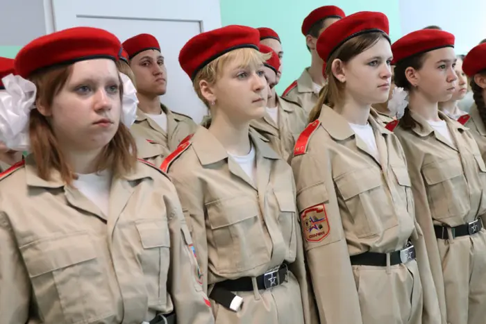 Ukrainian children in military gear