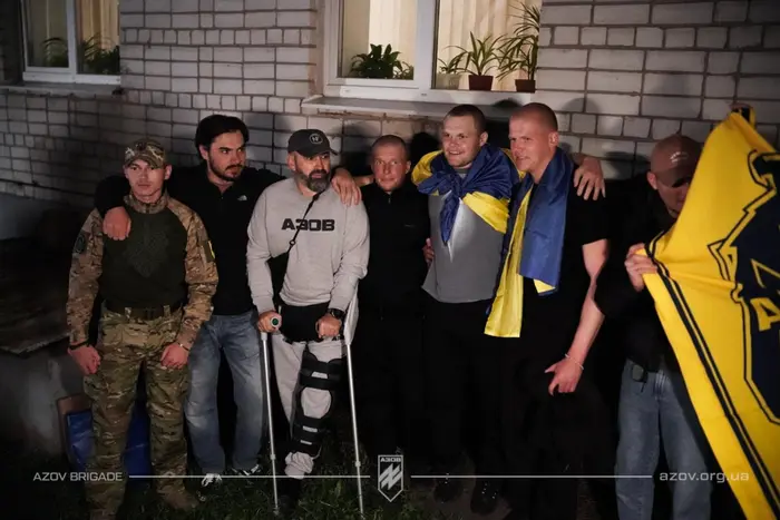 Azov fighters return home