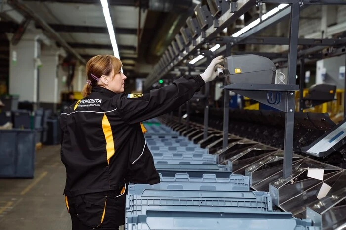 Five packages on the conveyor