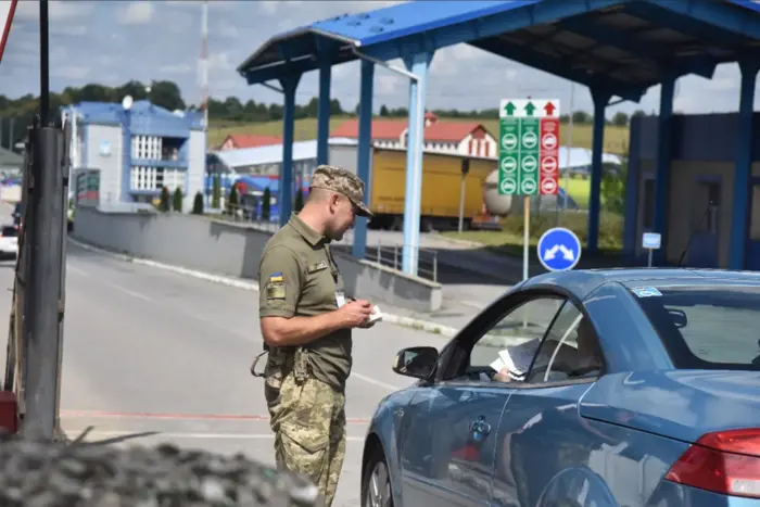 Man with bloody hands at the checkpoint