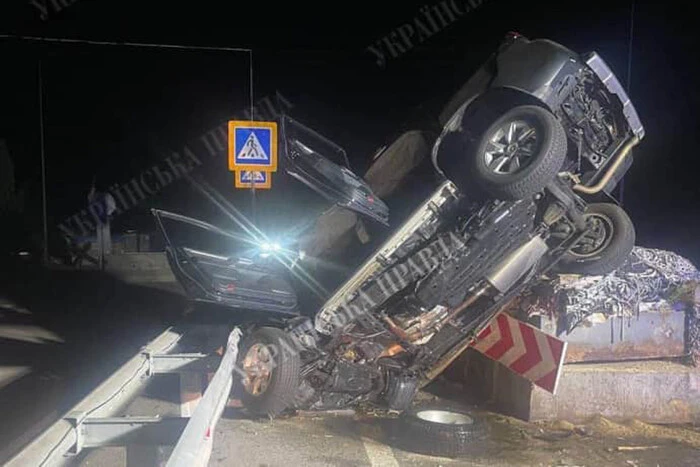 Car with damaged front bumper on the road