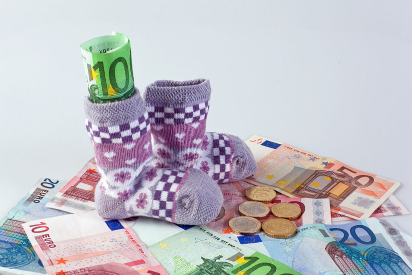 Logo of Poland and Ukraine against the backdrop of money