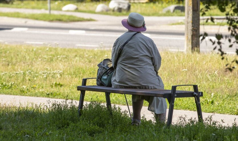 Elderly people with documents in hand