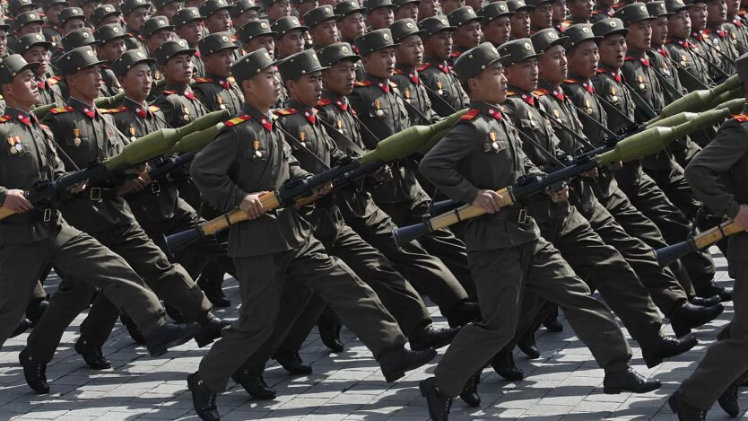 A battalion of soldiers stands in line