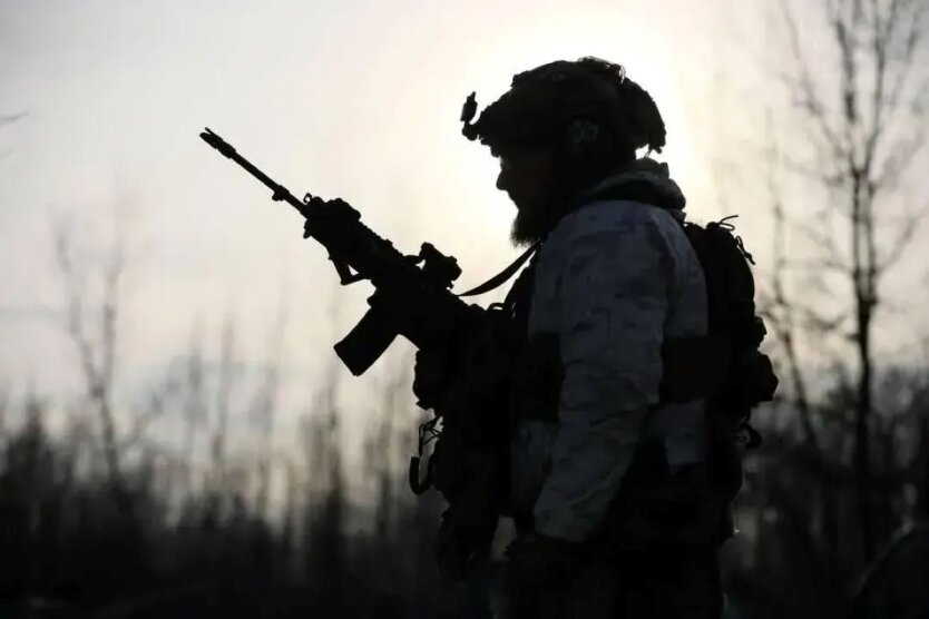 Image of a soldier with family